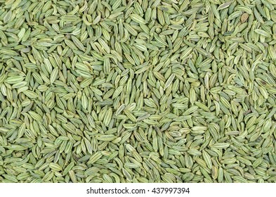 Cumin seeds closeup background texture.