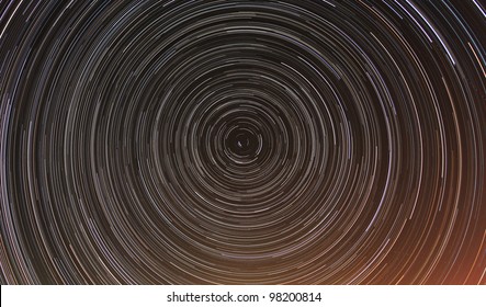 Cumulative Time Lapse Of Star Trails In Night Sky.