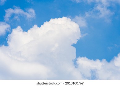 Cumulonimbus Clouds In The Deep Blue Summer Sky