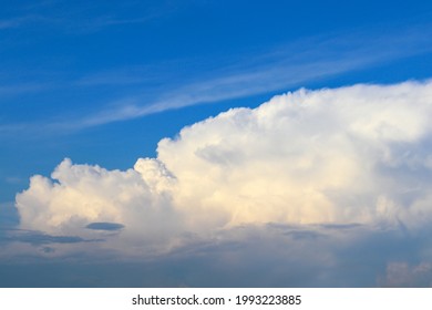Cumulonimbus incus large cloud at sunset