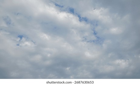 Cumulus castellanus clouds, which are a type of cloud characterized by multiple towers rising from a common base. The name 