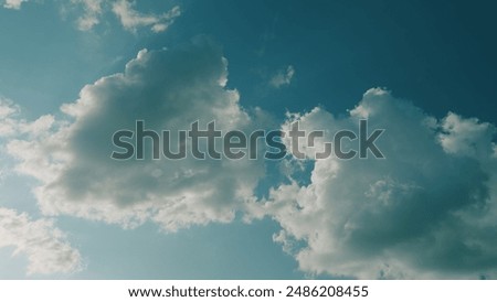 Cumulus Cloud Cloudscape Moving And Changing With Different Shapes. Puffy Fluffy White Clouds.
