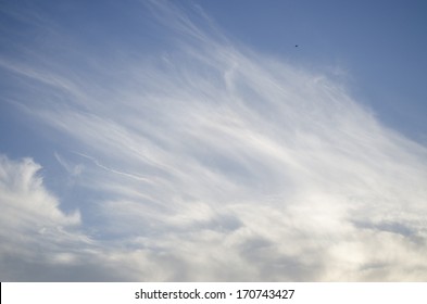 Cumulus clouds and veils