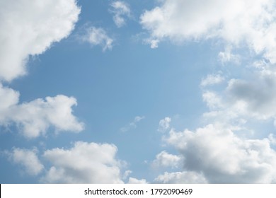 Cumulus Humilis Clouds In The Blue Sky, View From Below