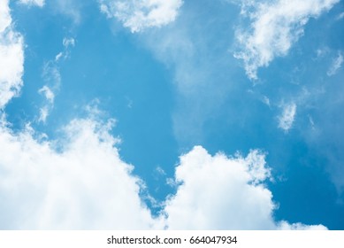 Cumulus humilis clouds in the blue sky, view from below - Shutterstock ID 664047934