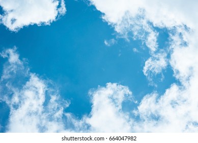 Cumulus Humilis Clouds In The Blue Sky, View From Below