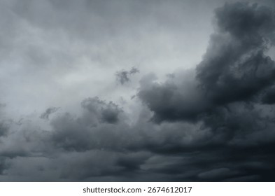 Cumulus storm clouds in dramatic sky creating powerful atmospheric background for weather, climate change, and moody nature concepts