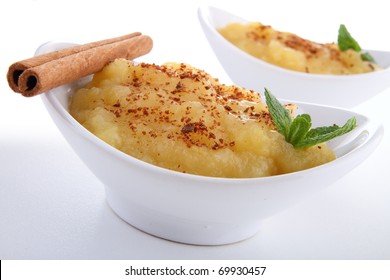 Cup Of Applesauce On White Background