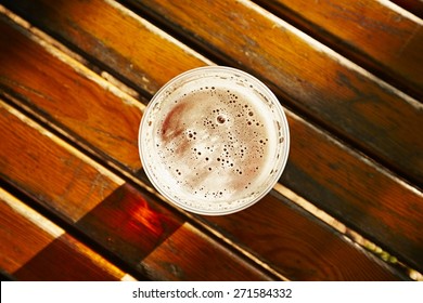 Cup Of Beer In Garden Restaurant