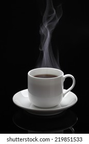 Cup Of Black Coffee/Cup Of Black Coffee With Steam On The Black Background