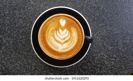 a cup of cappucino with art. 2 February 2021, Bandung Indonesia.