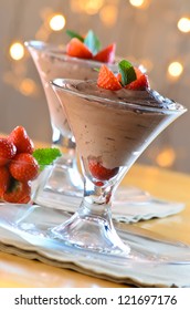 Cup With Chocolate Mousse Dessert With Strawberry And Mint Leaf