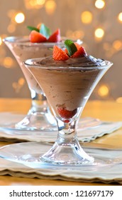 Cup With Chocolate Mousse Dessert With Strawberry And Mint Leaf