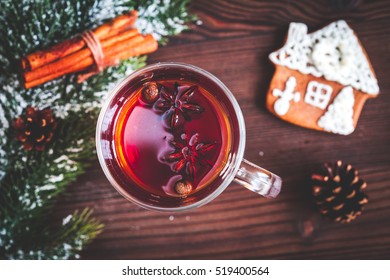 Cup With Christmas Mulled Wine On Wooden Background Top View