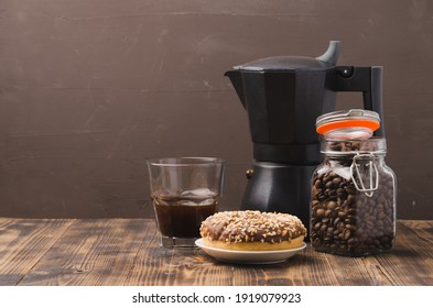 Cup Of Cofee With Cofee Beans And Black Maker. Selective Focus. 