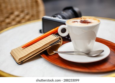 Cup of coffe on the table. 