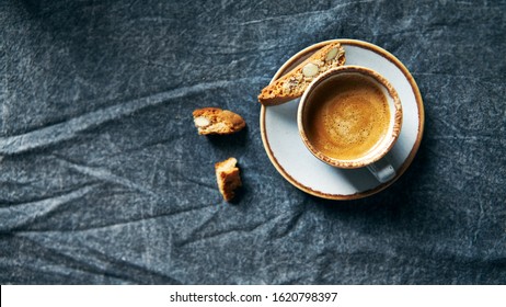 Cup of coffee with almond cookie. Top view - Powered by Shutterstock