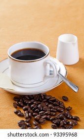 cup of coffee and coffee beans