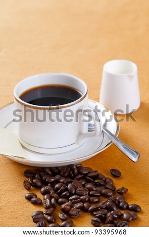 cup of coffee and coffee beans