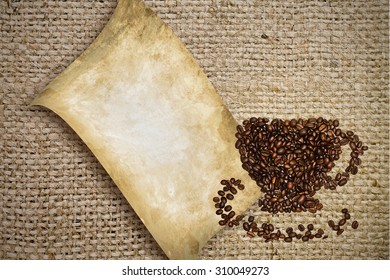 Cup of coffee beans on the background of burlap - Shutterstock ID 310049273