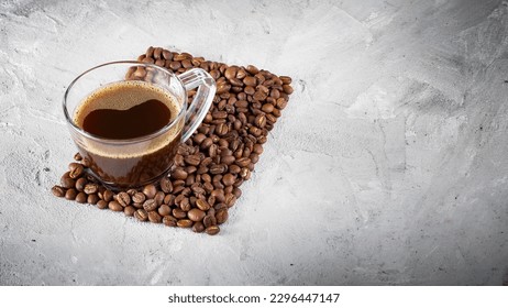 Cup and coffee beans on rustic background, coffee from Colombia