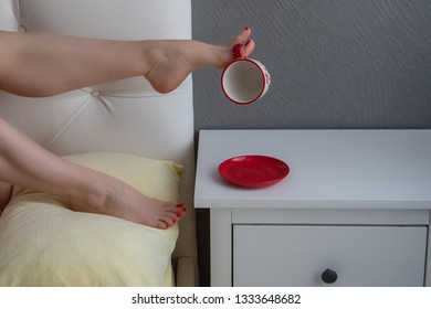 Cup of coffee in bed