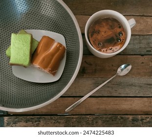 Cup of coffee and bread on the table