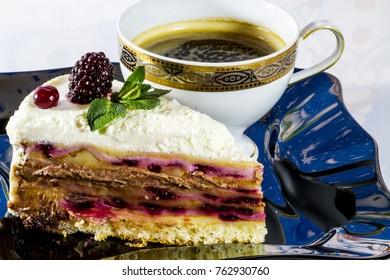 a cup of coffee and a cake