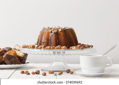 Cup Of Coffee And Cake On  Wooden Table