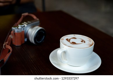 cup of coffee and camera