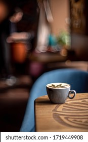 Cup Of Coffee Cappuccino On Wooden Table Texture Daylight Sunlight Cafe Coffee House Restaurant Side View