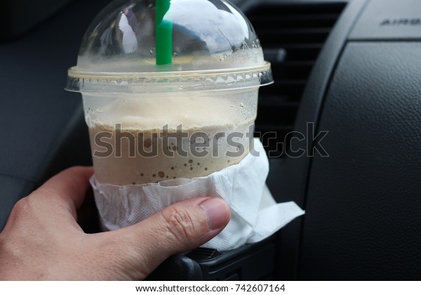 cup coffee in\
car
