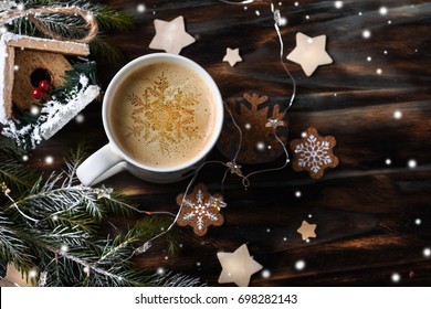 Cup Of Coffee With Christmas Decorations On Dark Wooden Table.