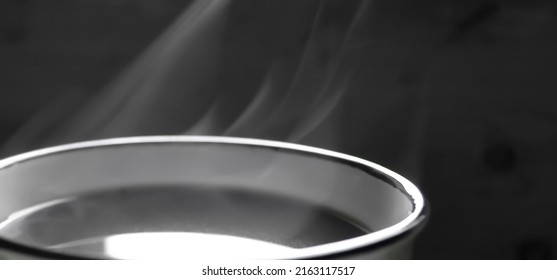 From A Cup Of Coffee Comes Steam. Steam From A Cup. Hot Coffee. Black And White Photo. Hot Drink. Smoke From A Cup. Steam From Hot Coffee.