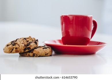 Cup Of Coffee And Cookies On White Background