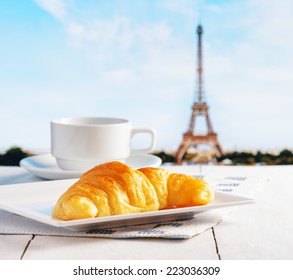 Cup Of Coffee And Croissant In Paris. French Cafe.