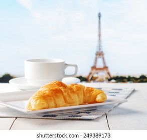 Cup Of Coffee And Croissant In Paris. French Cafe.