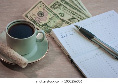 in a Cup of coffee and documents