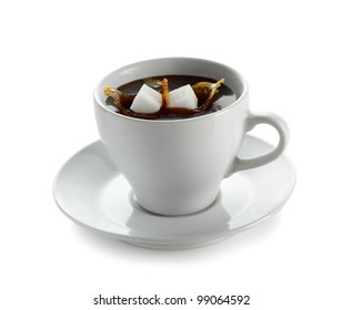 Cup Of Coffee With Falling Sugar Cube