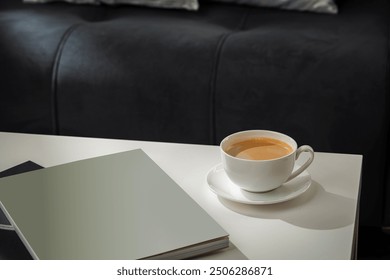 A Cup of Coffee, Glasses, and a Stack of Magazines on a White Tabletop