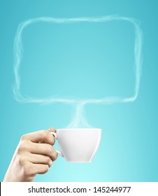 Cup Of Coffee In Hand With Bubble Talk