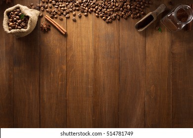 cup of coffee and ingredients on wooden background - Powered by Shutterstock