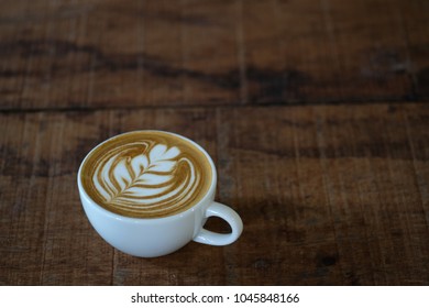 cup of coffee latte on the table with empty space