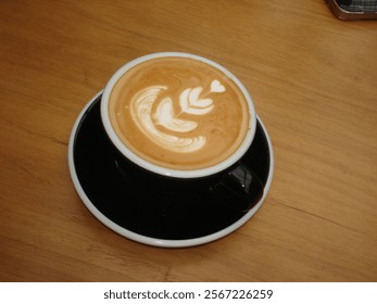 a cup of coffee latte that taken by 2006 digital camera - Powered by Shutterstock