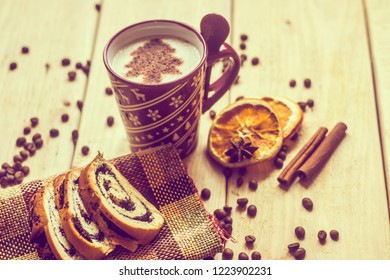 cup of coffee with a new year pattern. Christmas tree made of cinnamon in a cup with coffee. good New Year spirit. New Year's and Christmas.