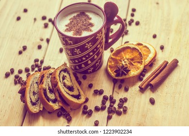 cup of coffee with a new year pattern. Christmas tree made of cinnamon in a cup with coffee. good New Year spirit. New Year's and Christmas.