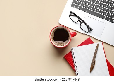 Cup of coffee, notebooks, eyeglasses and laptop on color background, closeup - Powered by Shutterstock