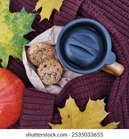 A cup of coffee, oatmeal cookies and a pumpkin in anticipation of Halloween. - Powered by Shutterstock