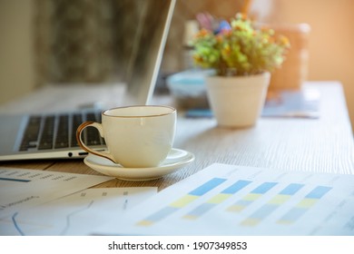 A Cup Of Coffee On The Desk In The Morning