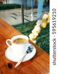 a cup of coffee on table
